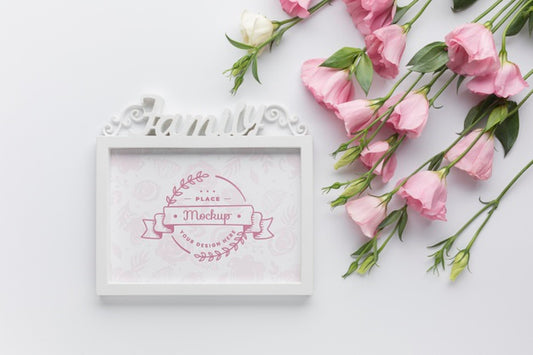 Free Top View Of Frame With Pink Roses Psd