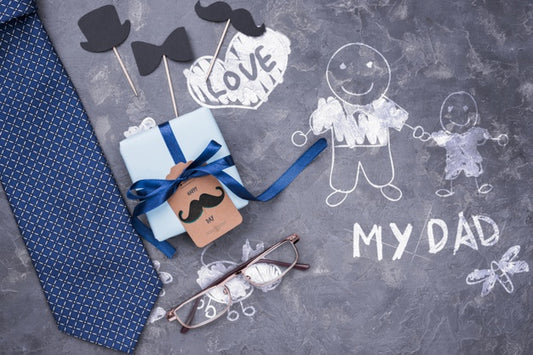 Free Top View Of Gift And Tie With Glasses For Fathers Day Psd