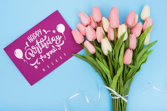 Free Top View Of Happy Birthday Bouquet Of Tulips With Card For Anniversary Celebration Psd