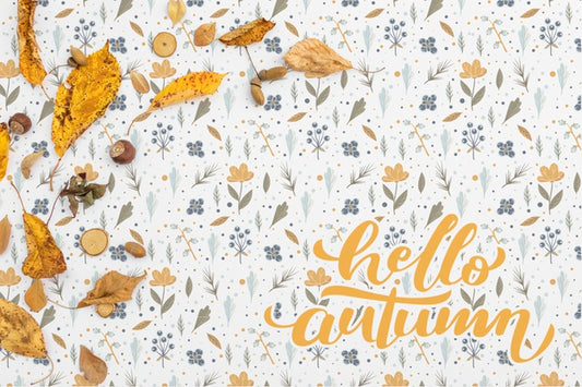 Free Top View Of Hello Autumn With Leaves Psd