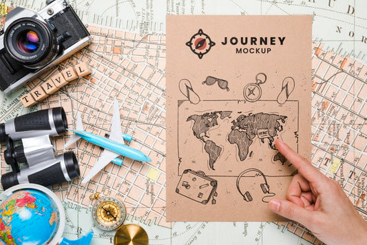 Free Top View Of Map Mock-Up Traveling Essentials Psd