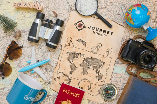 Free Top View Of Map With Magnifying Glass And Camera For Traveling Psd