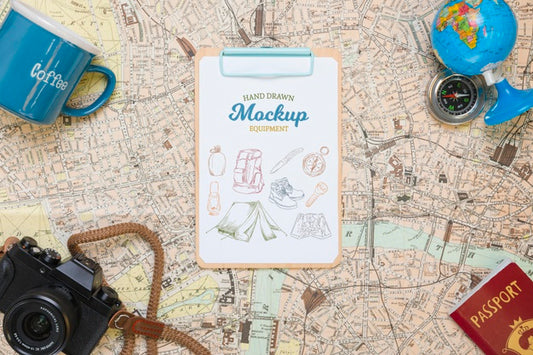 Free Top View Of Map With Mock-Up Traveling Essentials Psd