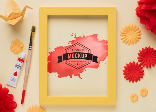 Free Top View Of Mock-Up Frame With Paint Tube And Brush Psd