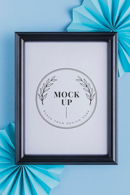 Free Top View Of Mock-Up Frame With Paper Rosettes Psd