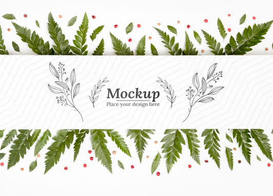 Free Top View Of Mock-Up With Leaves Psd