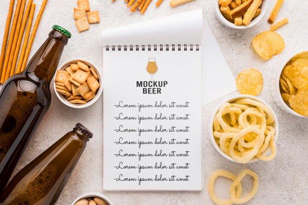 Free Top View Of Notebook With Beer Bottles And Assortment Of Snacks Psd