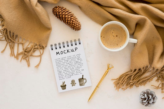 Free Top View Of Notebook With Coffee And Scarf Psd
