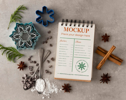 Free Top View Of Notebook With Snowflake Forms And Cinnamon Psd
