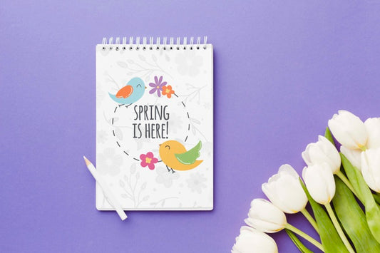 Free Top View Of Notebook With Spring Tulips Psd