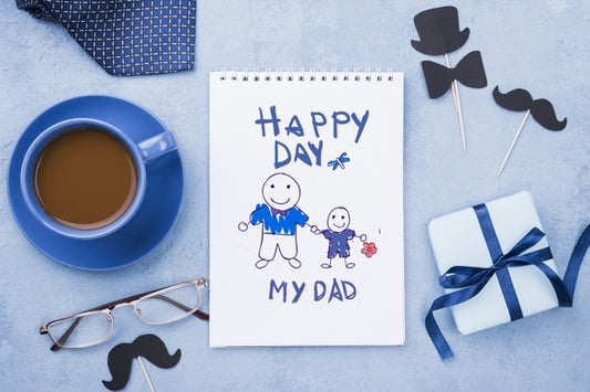 Free Top View Of Notepad With Coffee And Glasses For Fathers Day Psd