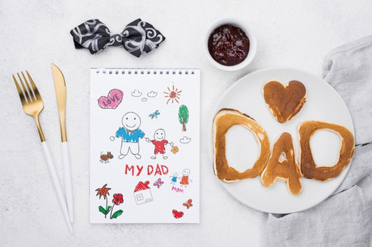 Free Top View Of Notepad With Plate Of Pancakes And Muffin For Fathers Day Psd