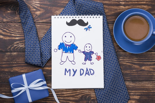 Free Top View Of Notepad With Tie And Coffee For Fathers Day Psd