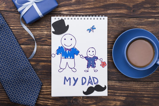 Free Top View Of Notepad With Tie And Gift For Fathers Day Psd