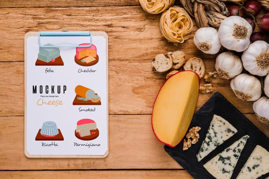 Free Top View Of Notepad With Variety Of Cheese And Garlic Psd