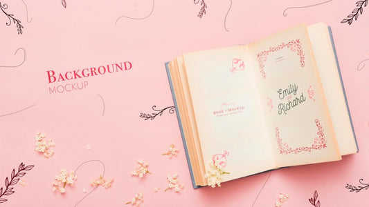 Free Top View Of Open Book And Flowers Psd
