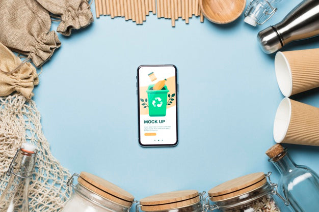 Free Top View Of Paper Cups And Zero Waste Items With Smartphone Psd