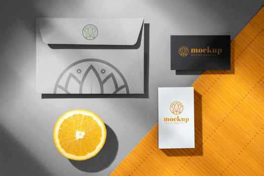 Free Top View Of Paper Stationery With Citrus Fruit Psd