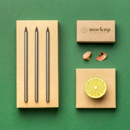 Free Top View Of Paper Stationery With Citrus Psd