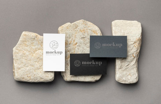 Free Top View Of Paper Stationery With Stones Psd