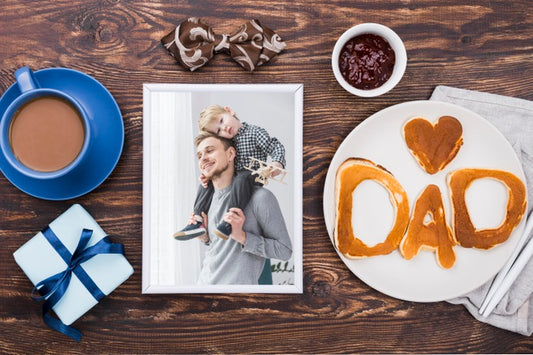 Free Top View Of Photo With Coffee And Gift For Fathers Day Psd