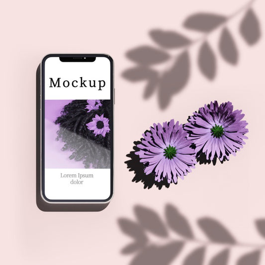 Free Top View Of Smartphone With Flowers And Shadow Psd