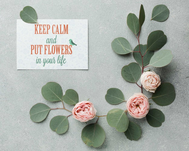 Free Top View Of Soft Roses With Leaves And Card Psd