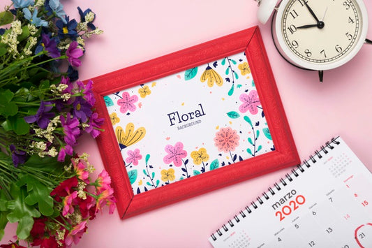 Free Top View Of Spring Flower With Calendar And Frame Psd