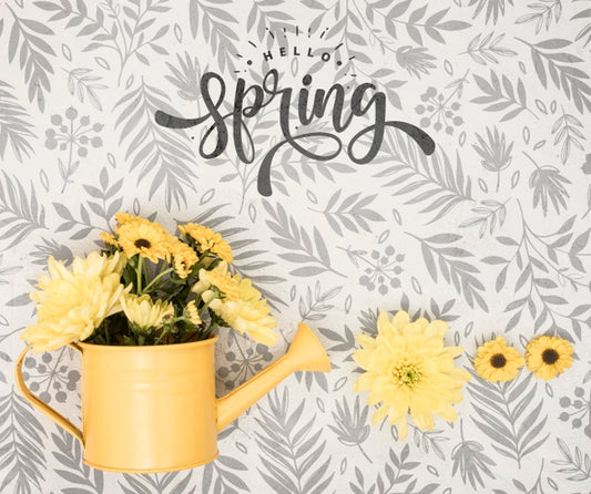 Free Top View Of Spring Flowers In Watering Can Psd