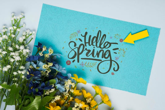 Free Top View Of Spring Flowers With Card Psd
