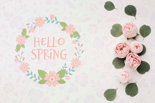 Free Top View Of Spring Roses And Leaves Psd