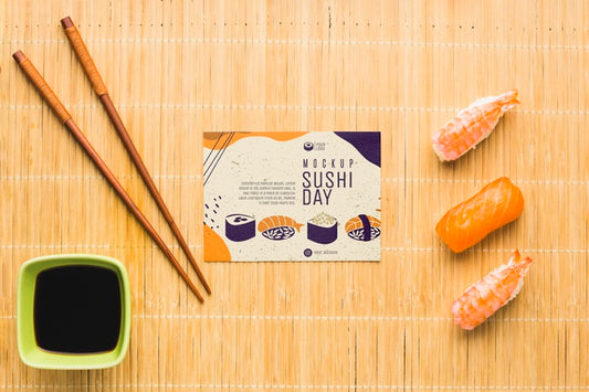Free Top View Of Sushi With Chopsticks And Soy Sauce Psd