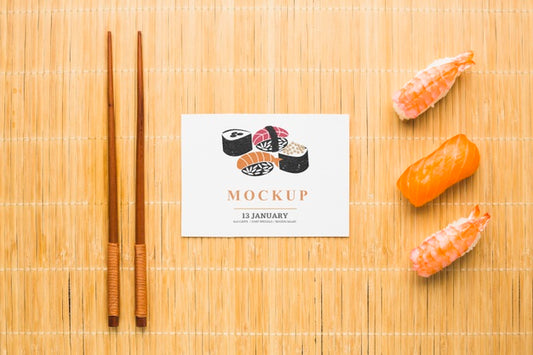 Free Top View Of Sushi With Chopsticks Psd