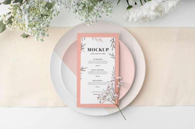 Free Top View Of Table Arrangement With Spring Menu Mock-Up And Flowers Psd