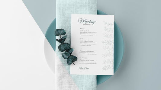 Free Top View Of Table Arrangement With Spring Menu Mock-Up And Leaves Psd