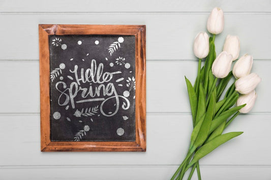 Free Top View Of Tulips Bouquet With Blackboard Psd