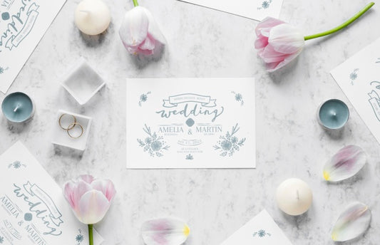 Free Top View Of Wedding Card With Rings And Tulips Psd