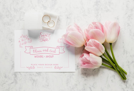 Free Top View Of Wedding Card With Tulips And Rings Psd