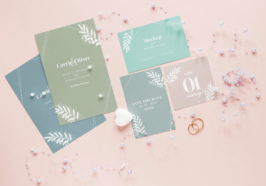 Free Top View Of Wedding Cards With Rings And Heart Psd