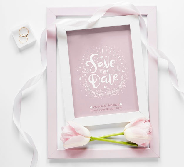 Free Top View Of Wedding Frame With Tulips And Ribbon Psd