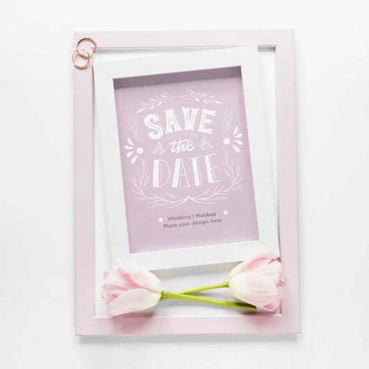Free Top View Of Wedding Frame With Tulips And Rings Psd