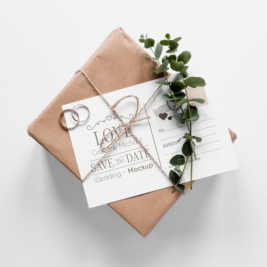 Free Top View Of Wedding Gift With Card And Rings Psd