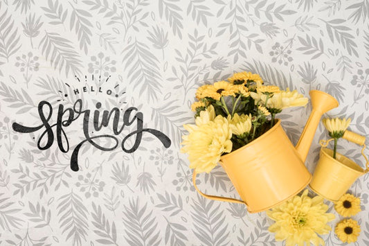 Free Top View Of Yellow Spring Flowers In Watering Can Psd