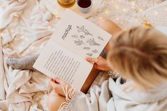 Free Top View On Woman Reading From A Book Mockup Psd