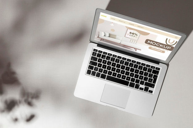 Free Top View Opened Laptop With Screen Mockup With Shadows Psd