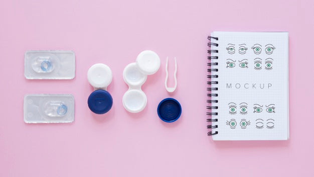 Free Top View Optics Still Life Arrangement With Notebook Mock-Up Psd