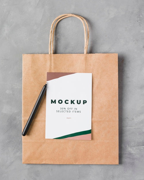 Free Top View Paper Bag Mock-Up With Pen Psd