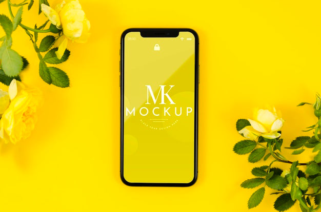 Free Top View Phone Mock-Up With Flowers Psd