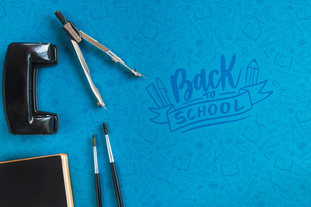 Free Top View School Arrangement With Compass And Hole Puncher Psd