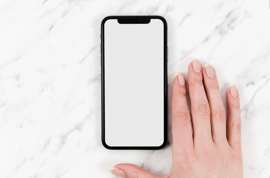 Free Top View Smartphone Mock-Up With Hand Psd